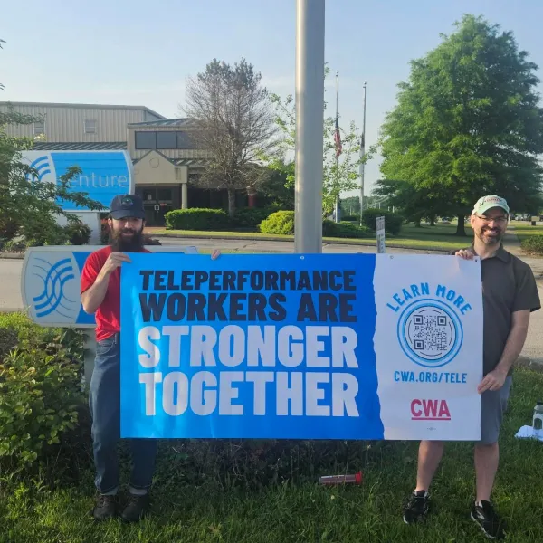Workers with Teleperformance Banner